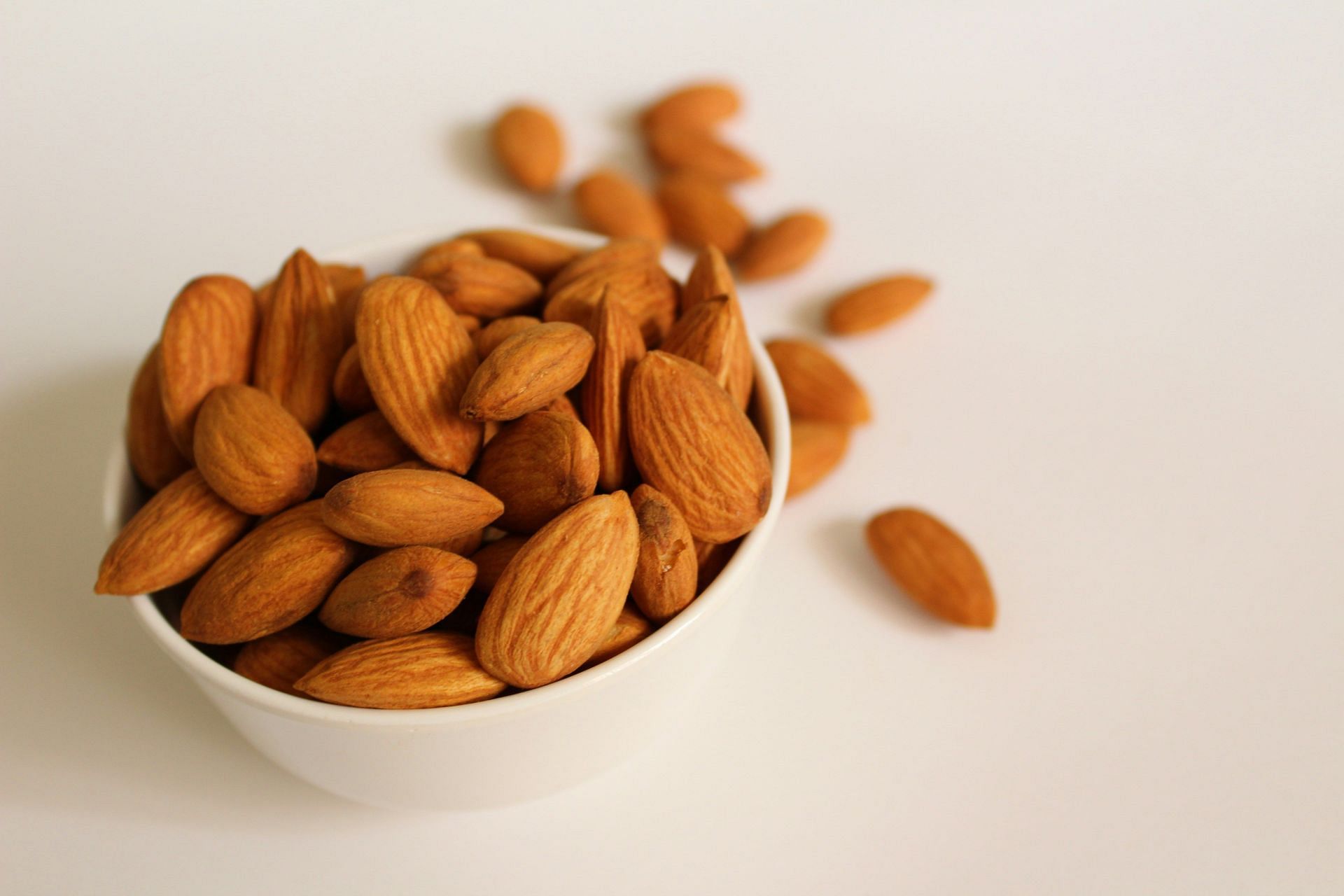 When snacking on almonds, just have a handful of them (image by Mockupo/Unsplash)